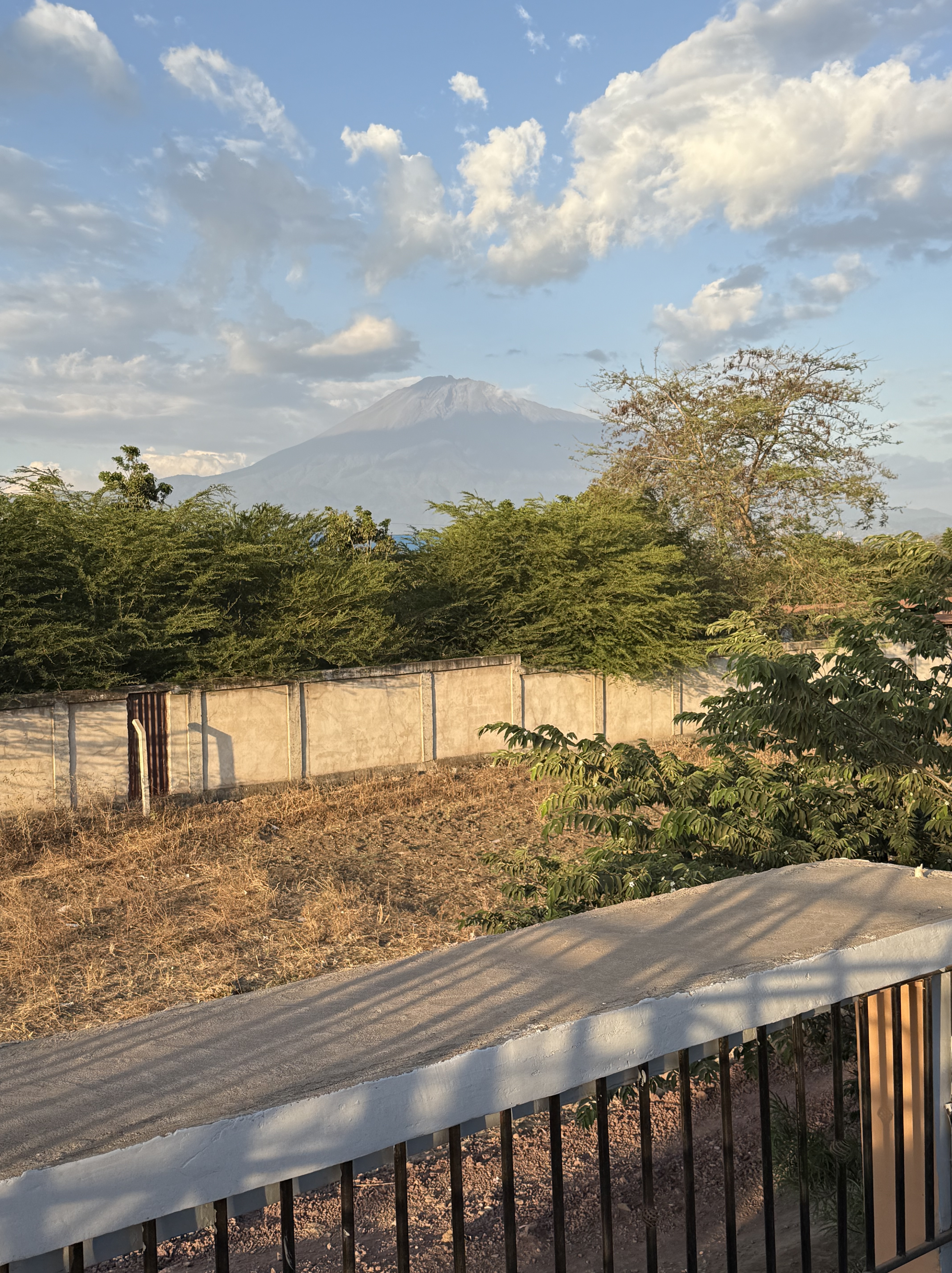 Mount Meru with a cloudy, blue sky
